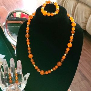 Set of necklace, earrings, bracelet